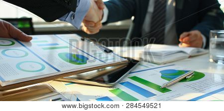 Businessman In Sut Hand Shake In Ofiice Closeup. Introduce Manager Job Man Risk Chart Paper How Deal