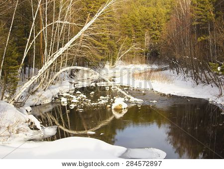 Winter Runs A River In A River A Big Stone Fell Into A River A Tree