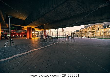 Duesseldorf, Germany - January 20, 2019: Unidentified Pedestrants Walk By The Apollo Theater At Rive