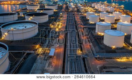 Gas Storage Tank, Oil Storage Tank, Aerial View Oil And Gas Storage At Night.