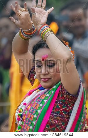 Kolkata , India - March 1, 2018: Expression Of Woman Dancer, Dressed In Traditional Indian Sari And 