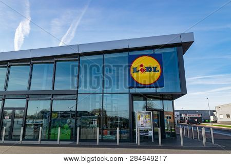 Mouscron,belgium-february 17,2019: View Of Lidl Supermarket And Logo.lidl Stiftung & Co. Kg  Is A Ge
