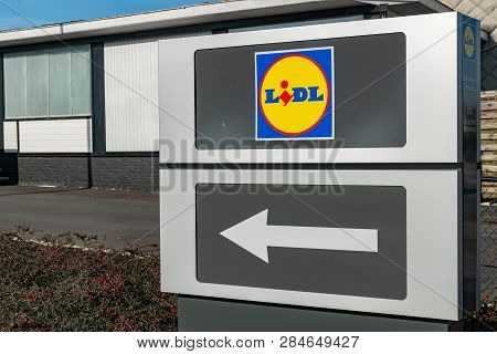 Mouscron,belgium-february 17,2019:  View Of The Lidl Supermarket Logo.lidl Stiftung & Co. Kg  Is A G