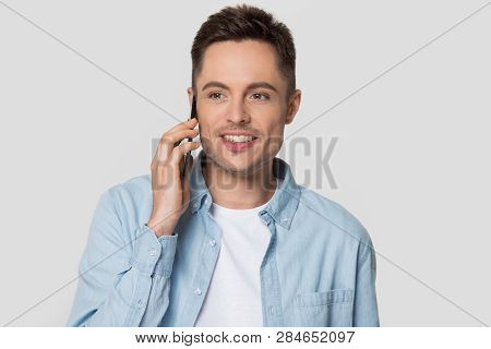 Happy Man Holding Cellphone Talking On Phone Isolated On Background