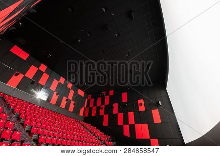 Russia, Nizhny Novgorod - November 14, 2016: Cinema Imperia Grez Nebo, Dolby Atmos. Empty Red Cinema