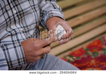 Meerschaum Carving Master. Shaping With Carving Knife. The Art Of Meerschaum Hand