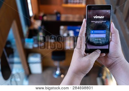 Chiang Mai, Thailand - April 21,2018: Man Holding Huawei With Vimeo On Screen.  Vimeo Is A Video-sha