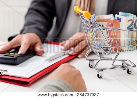 Concept Corruption, Bribe Or Bank Credit, Bodyparts Of Two Women And Euro Banknotes