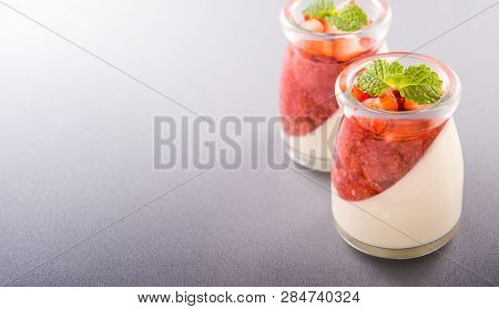 Delicous And Nutritious Double Color (colour) Strawberry Desserts With Mint And Diced Sarcocarp Topp