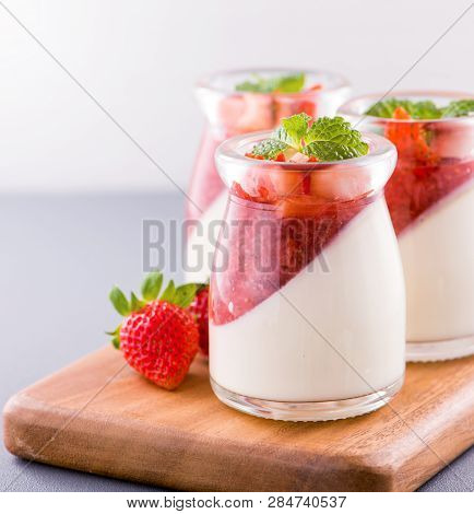 Delicous And Nutritious Double Color (colour) Strawberry Desserts With Mint And Diced Sarcocarp Topp