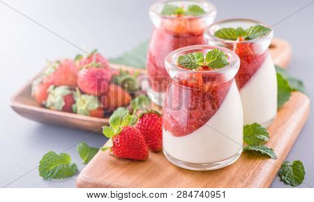 Delicous And Nutritious Double Color (colour) Strawberry Desserts With Mint And Diced Sarcocarp Topp