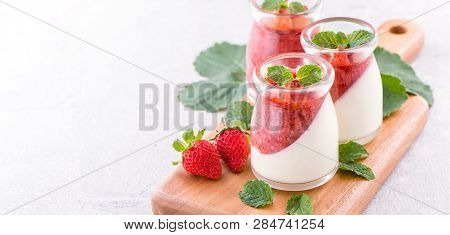 Delicous And Nutritious Double Color (colour) Strawberry Desserts With Mint And Diced Sarcocarp Topp