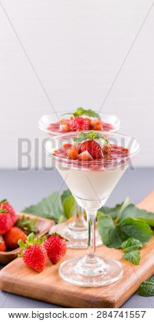 Delicous And Nutritious Double Color (colour) Strawberry Desserts With Mint And Diced Sarcocarp Topp