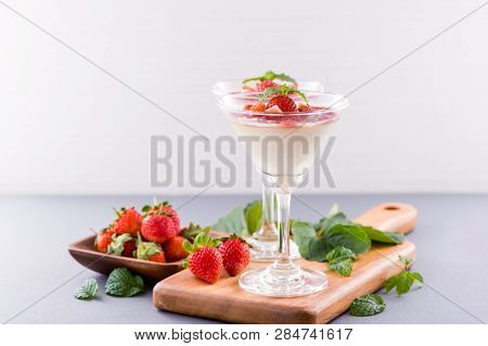 Delicous And Nutritious Double Color (colour) Strawberry Desserts With Mint And Diced Sarcocarp Topp