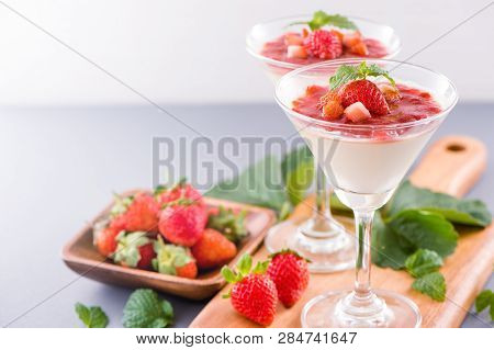 Delicous And Nutritious Double Color (colour) Strawberry Desserts With Mint And Diced Sarcocarp Topp