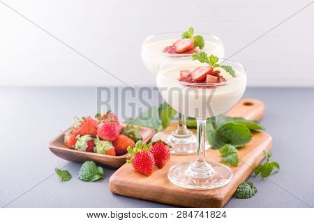 Delicous And Nutritious Double Color (colour) Strawberry Desserts With Mint And Diced Sarcocarp Topp