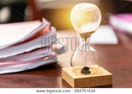 Business Working Jobs Remaining With Hourglass For Time Work Concept.