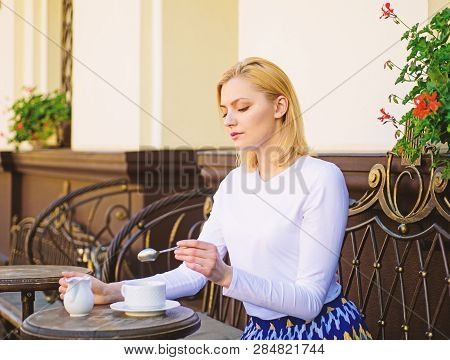Traditional Tea With Milk. Woman Elegant Calm Face Have Drink Cafe Terrace Outdoors. Girl Drink Tea 