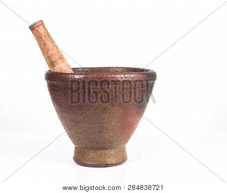Red Clay Mortar Kitchen Tool On White.