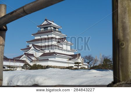 Tsuruga-jo Castle During Winter With Snow Covered When Day Time In Fukushima, Japan.