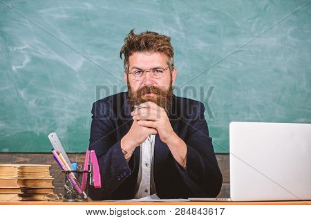Teacher Concentrated Bearded Mature Schoolmaster Listening With Attention. Pay Attention To Details.