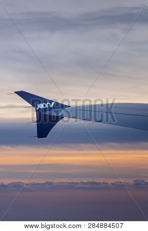Paris, France - 12/22/18: Air France Joon Airplane In The Air With Beautiful Wing In The Stunning Su