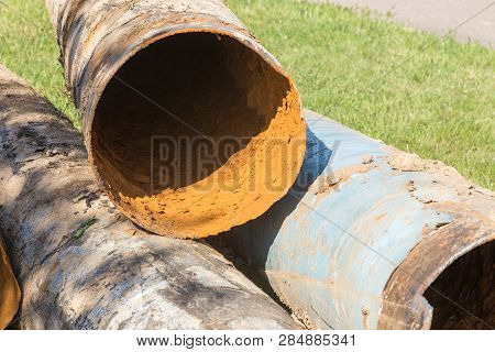 Replacement Of Old Rusted Broken Metal Water Pipes With Modern Plastic Pipes. Plastic Pipes Ready To