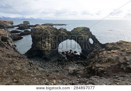 Unique Arch Rock At Arnarstapi On Snaefelsnes Peninsula In Iceland.