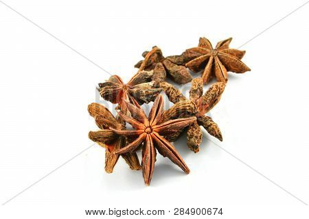 Chinese Spice Star Anise Fruit Isolated On White Background / Star Aniseed Badian Khatai - Tradition