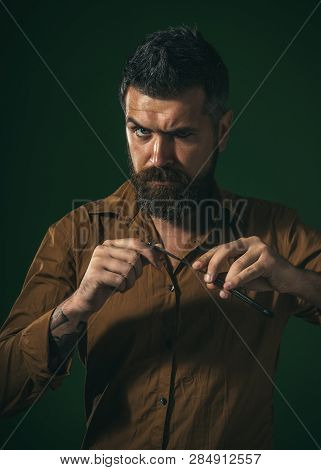 Sexy Macho With Straight Razor. Hairdresser In Stylish Shirt Demonstrate Sharp Blade Dangerous Razor