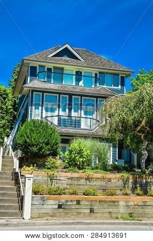 Residential House Built Up On Land Terrace In Vancouver, British Columbia