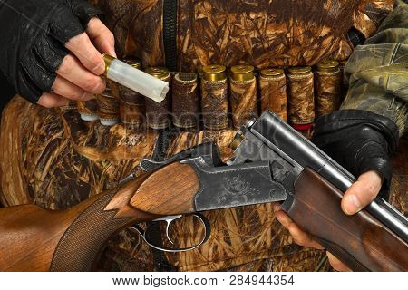 Hand Of The Hunter Removed Discharged Shell From Double-barreled Shotgun, Closeup