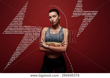 If You Can Believe It, The Mind Can Achieve It. Young Sportswoman Standing Over Red Background. Grap