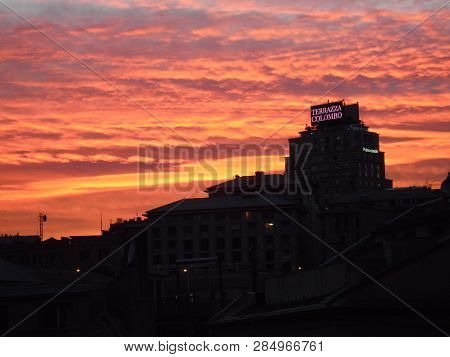 Genova, Italy - 02/12/2019: An Amazing Caption Of The Sunset Over The City Of Genoa In Winter Days C