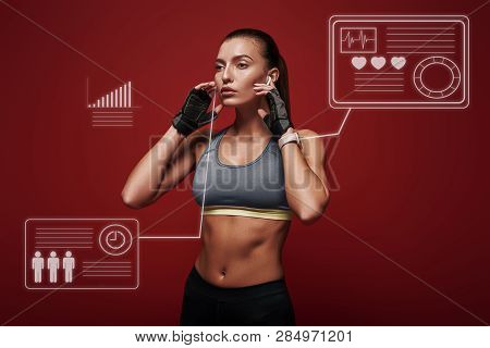 Free Your Mind Sportswoman Is Listening To Music Standing Over Red Background. Game Concept With Gra