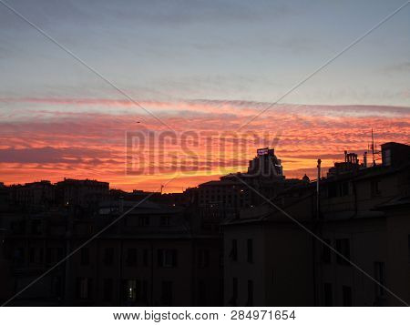 Genova, Italy - 02/12/2019: An Amazing Caption Of The Sunset Over The City Of Genoa In Winter Days C