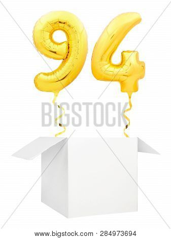 Golden Number Ninety Four Inflatable Balloon With Golden Ribbon Flying Out Of Blank White Box Isolat