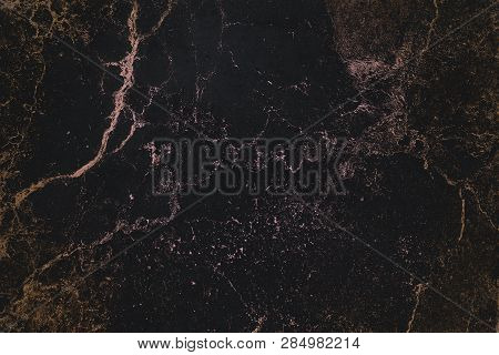 Black Texture with Pink Gold. Luxury Texture. Black Gold Background.