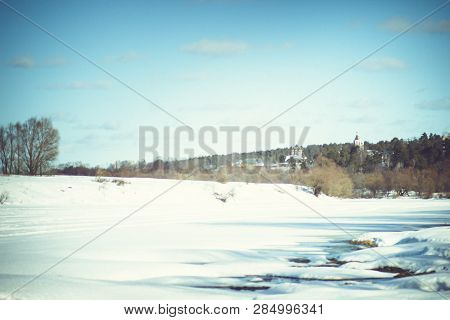 White Snow On A Small River In Russia In Winter
