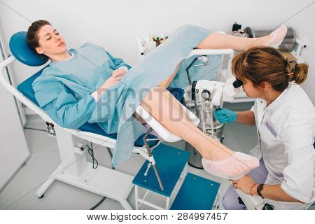 Woman During Examination By A Gynecologist. Having Advise With Her Gynecologist. Colposcopy