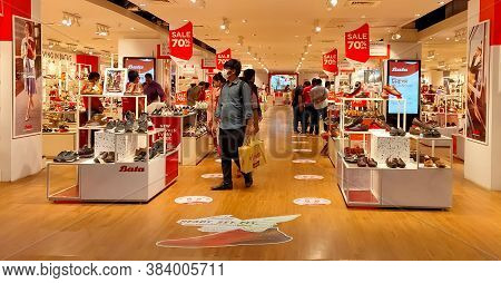 24 Aug 2020,  Dhaka, Bangladesh. Modern Shoe Shop With Ladies, Gents And Kids Items. Shoes Are On Bi