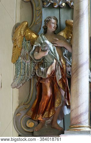 SAMARICA, CROATIA - SEPTEMBER 26, 2011: St. Raphael the archangel statue on the altar of St. Michael the archangel in the church of St. Catherine of Alexandria in Samarica, Croatia