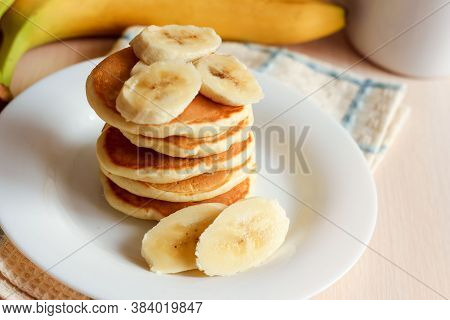 Sweet Homemade Stack Of Pancakes With Banana. Delicious Breakfast.