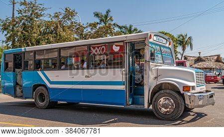 Acapulco, Mexico - November 25, 2008: Old Downtown. Costera Public White-blue Passenger Bus On Stree