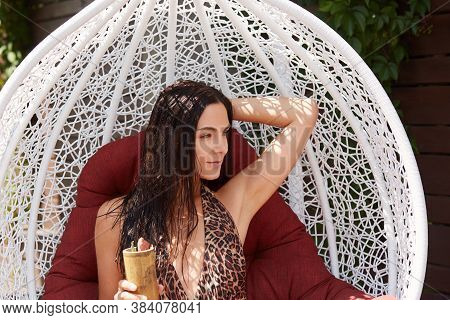 Beautiful Attractive Young Brunette Woman In Stylish Swimming Suit With Leopard Print, Posing In Whi