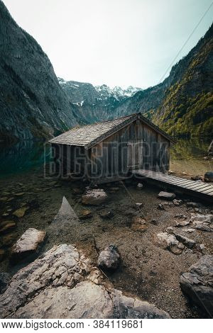 Obersee Lake Autumn Landscape. Stone In Crystal Water In Berchtesgaden National Park