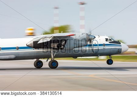 Transport Turboprop Airplane Landing On The Airport Runway