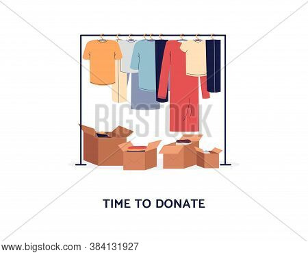 Clothes Donation Concept - Clothing Rack And Cardboard Boxes