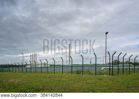 Fenced Landfall Station Of Nord Stream 2 In Lubmin Near Greifswald Under A Cloudy Sky, Gas Pipeline 