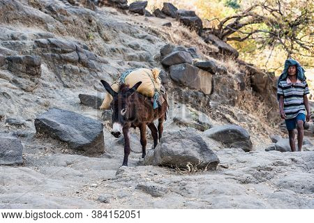 Tis Issat, Ethiopia - Feb 05, 2020: Ethiopian People Near The Bridge Of The Portuguese On The River 
